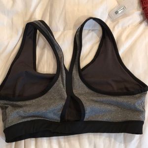 NWOT peephole Black & Gray Sports bra